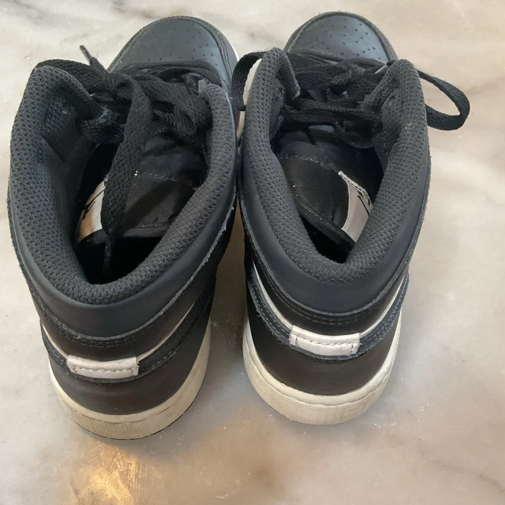 Jordan Kids Black and White High-Top Sneakers